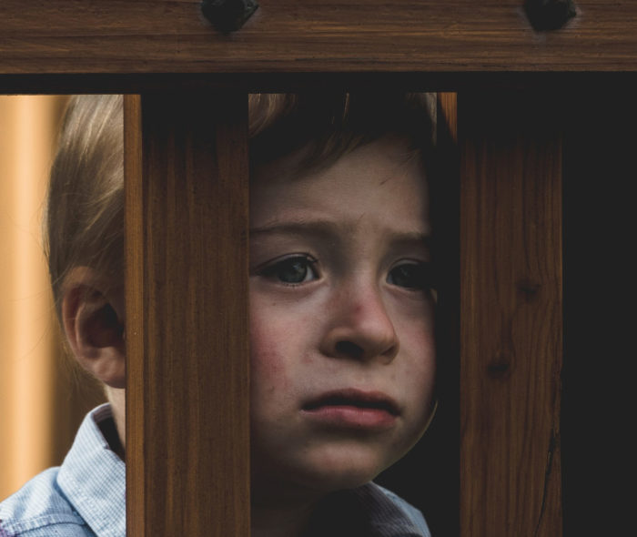 child with sad expression