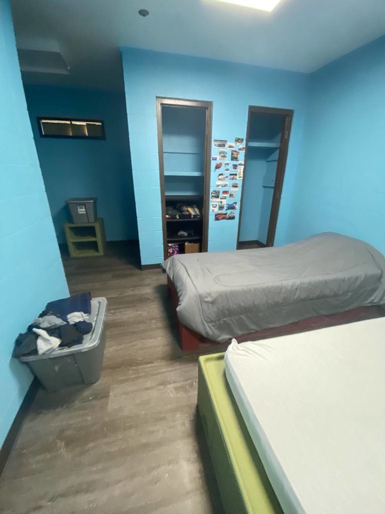A photograph of a bedroom at the facility.