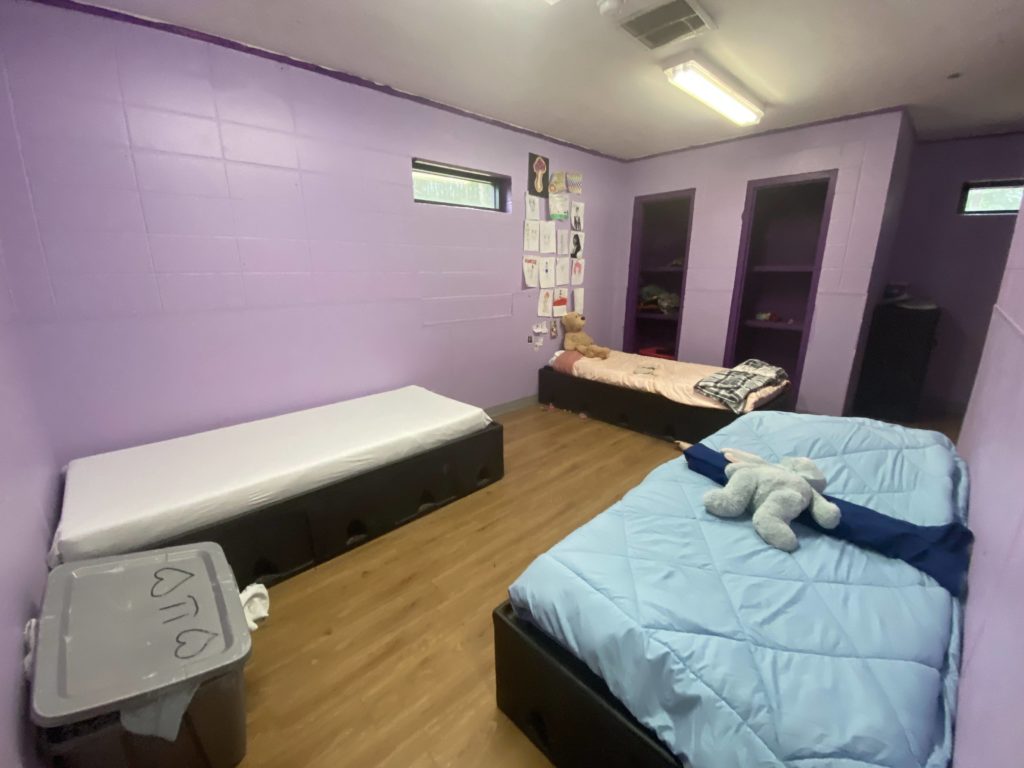 A photograph of a bedroom at the facility