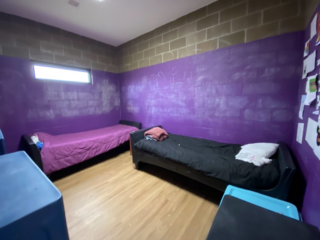 A photograph of a bedroom at the facility.