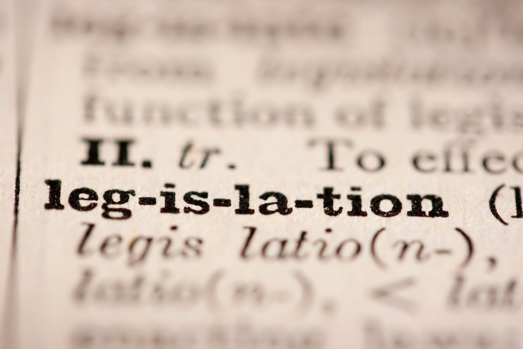 Word legislation from the old dictionary, a close up.